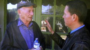 Mandell listens as playwright Joe Nava drives home a point (Photo: Bill Raden)