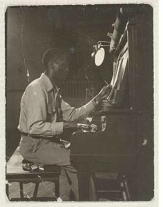 Claudius Wilson at piano, the Joseph Rickard Papers. The Huntington Library, Art Collections, and Botanical Gardens