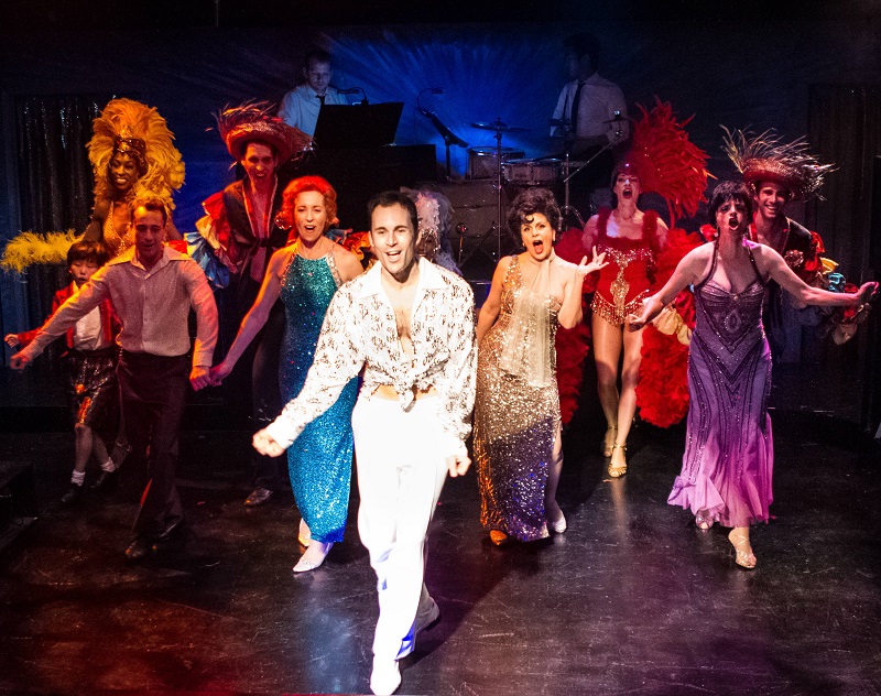 Andrew Bongiorno (center) as Peter Allen in the Celebration Theatre's West Coast premiere of The Boy from Oz,  directed by Michael A. Shepperd  at the Lex Theatre (photo by Casey Kringlen)