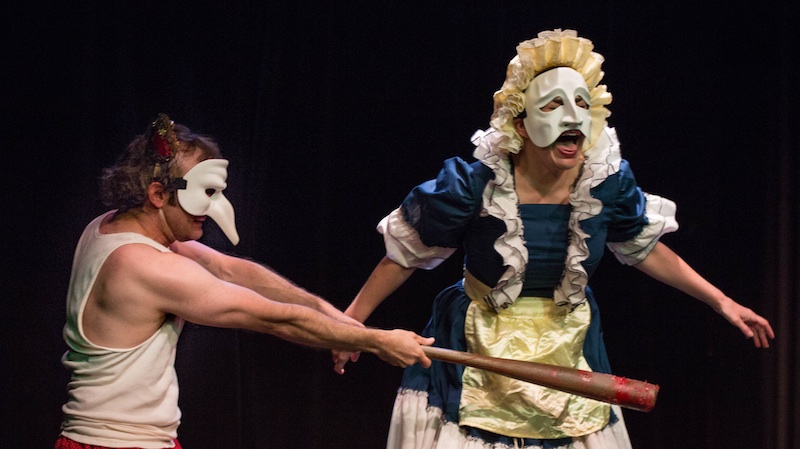 Jimmy Slonina slaps Sondra Mayer with a very big stick in the live-action Punch and Judy (photo by Darrett Sanders)