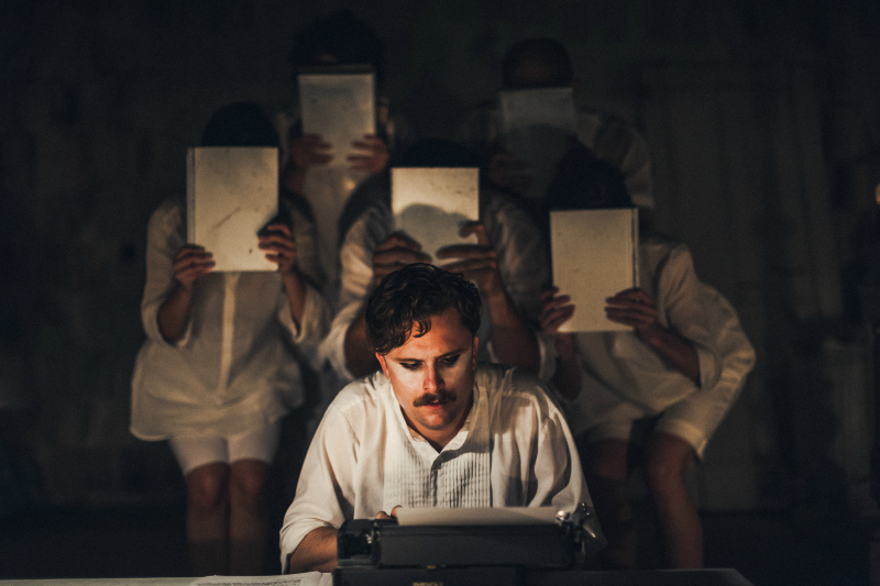 Max Baumgarten types away while Paula Rebelo, Caitlyn Conlin, Eli Weinberg, Zachary Sanders & Esther Hannaford loom behind in Mat Diafos Sweeney's adaptation of Gustave Flaubert’s The Temptation of St. Antony' from Four Larks (photo courtesy Four Larks)