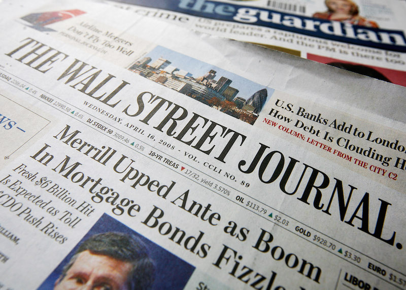 LONDON - APRIL 16:  A copy of the U.S. Edition of The Wall Street Journal on a copy of The Guardian, bith of which have been purchased at the same London newsagent on April 16, 2008 in London, England. It is the first day of the U.S Edition of the newspaper being on sale in U.K.  (Photo by Cate Gillon/Getty Images)