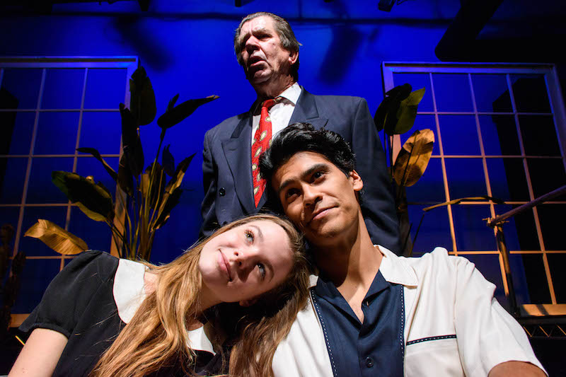 Claire Pido, Bo Roberts (standing) and Buddy Brown in The School For Wives at City Garage. (Photo by Paul Rubenstein)