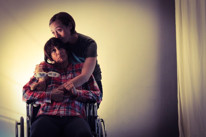 Melissa R. Randel (seated) and Ashley Steed are mother and daughter in Steed's When Skies Are Gray at the Hollywoood Fringes Festival Thymele Arts (Kansas Room). (Photo by Christina Bryan)