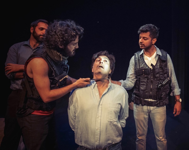 Bobak Cyrus Bakhtiari, Nima Jafari, Ted Monte and Ronak Ghandi in Christopher Vened’s play Infidel at Whitefire Theatre. (Photo by Darrett Sanders)